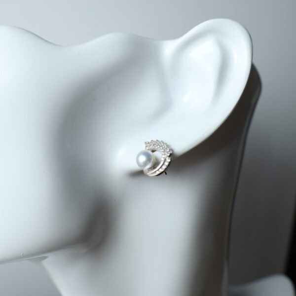 Boucles d’oreilles en perles à volute pavée