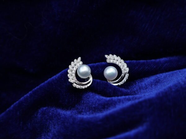 Boucles d’oreilles en perles à volute pavée