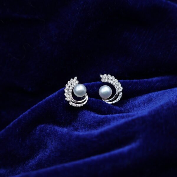 Boucles d’oreilles en perles à volute pavée