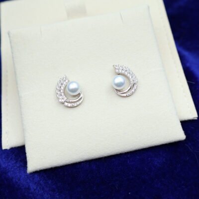 Boucles d’oreilles en perles à volute pavée