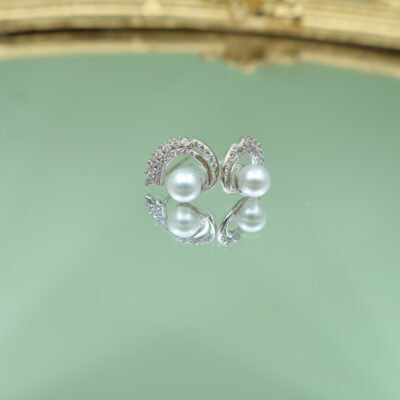 Boucles d’oreilles en perles à volute pavée