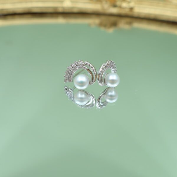 Boucles d’oreilles en perles à volute pavée
