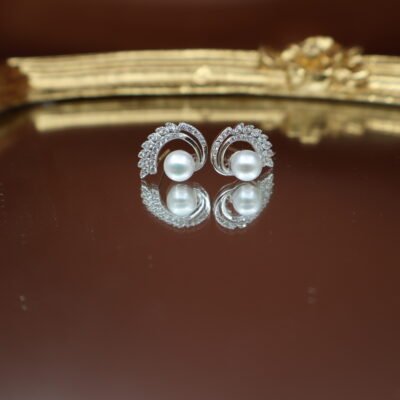 Boucles d’oreilles en perles à volute pavée