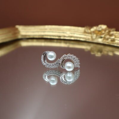Boucles d’oreilles en perles à volute pavée