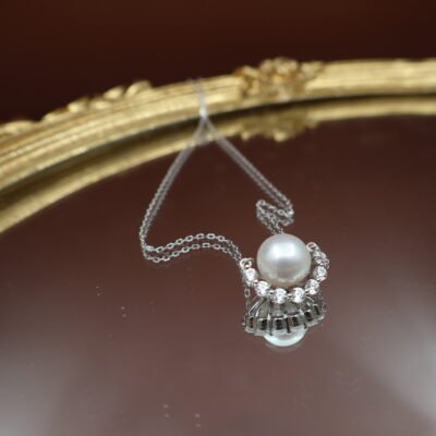 Collier en perle à motif cil pavé